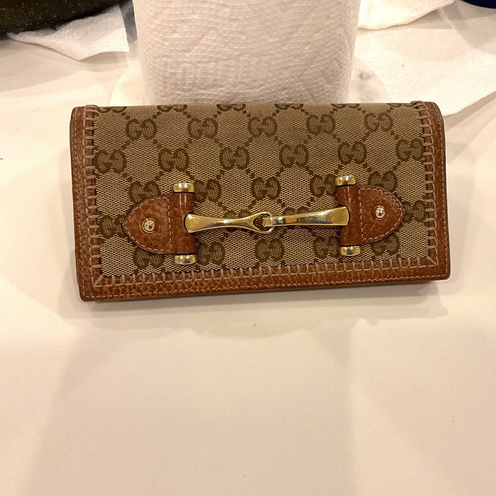 Gucci brown bow detailed clutch wallet